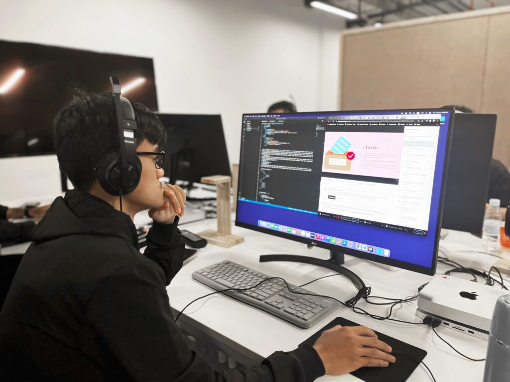 Student working on code at Above & Beyond School